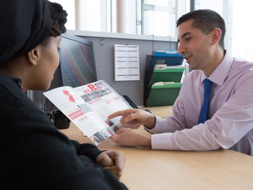 A counselor offers guidance to a student