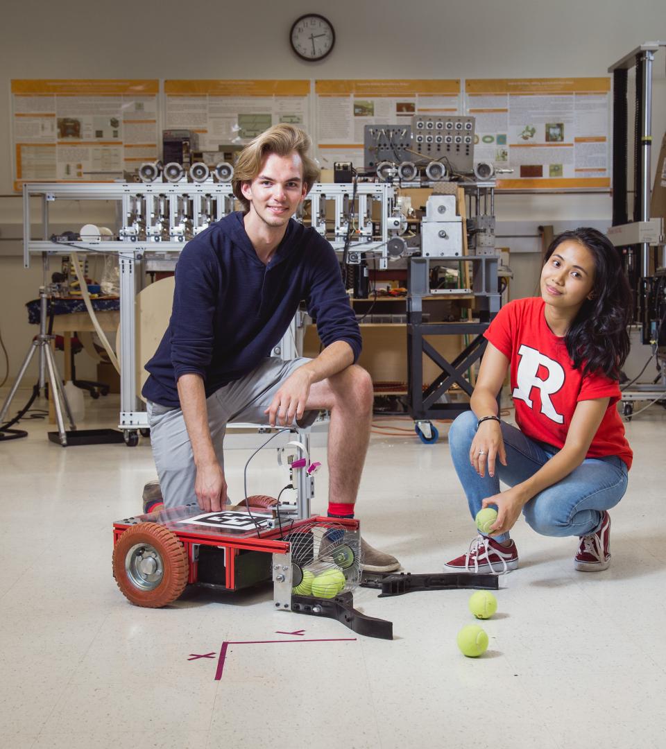 Two students at work in a lab